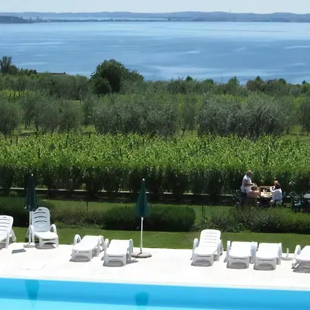 Апартаменты Appartamento Moniga del Garda